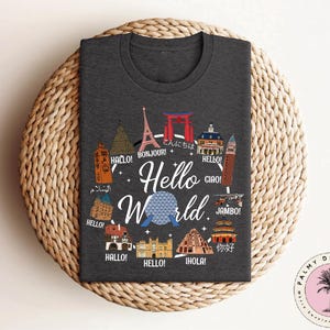 a black t - shirt with the words hello world on it