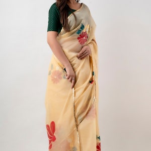 Hand-Painted Golden Floral Organza Saree: Custom Bollywood Style