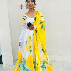Yellow Hand-Painted haldi Party lehenga choli for women and girls with custom blouse with chiffon dupatta embellished with heavy sequin work