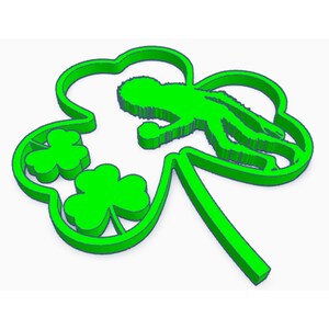 May include: A bright green shamrock-shaped cookie cutter with a leprechaun silhouette. The design features three clover leaves and a stem, perfect for St. Patrick's Day baking. The cutter is made of durable plastic.