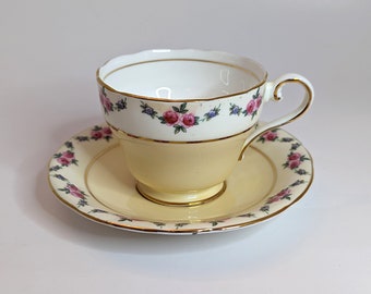 Aynsley England Light Yellow Floral Teacup and Saucer