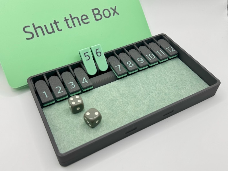 Shut The Box - 12-player. Historical dice game, pub game, travel game for 1 to 4 players. Luck and strategy. Dice Board Travel Game Green