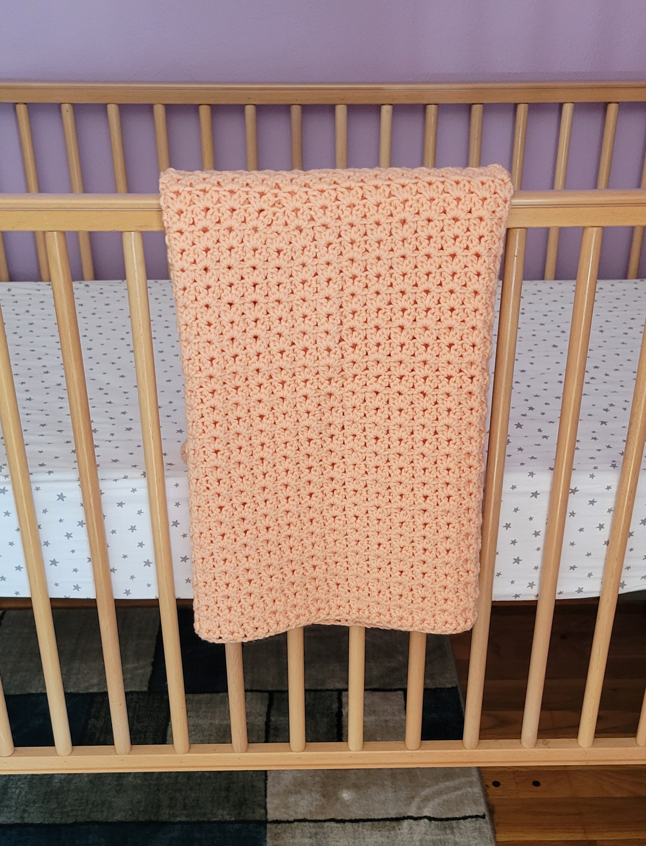 Peach cluster stitch crochet baby blanket