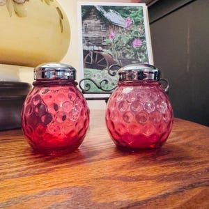 Pair of Fenton Glass Dot Optic Ruby Overlay (Cranberry) Salt and Pepper Shakers with Lids