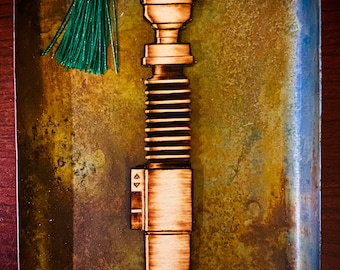 Marcapáginas hecho a mano con el sable de luz de Luke Skywalker