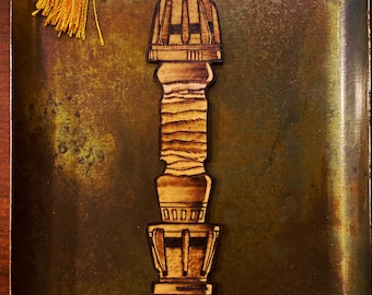 Marcapáginas hecho a mano con el sable de luz de Rey Skywalker