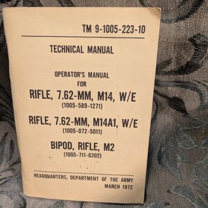 May include: A tan technical manual with black text. The manual is titled "Technical Manual" and includes information for the Rifle 7.62-MM, M14, W/E, and Bipod, Rifle, M2. The manual is dated March 1972.