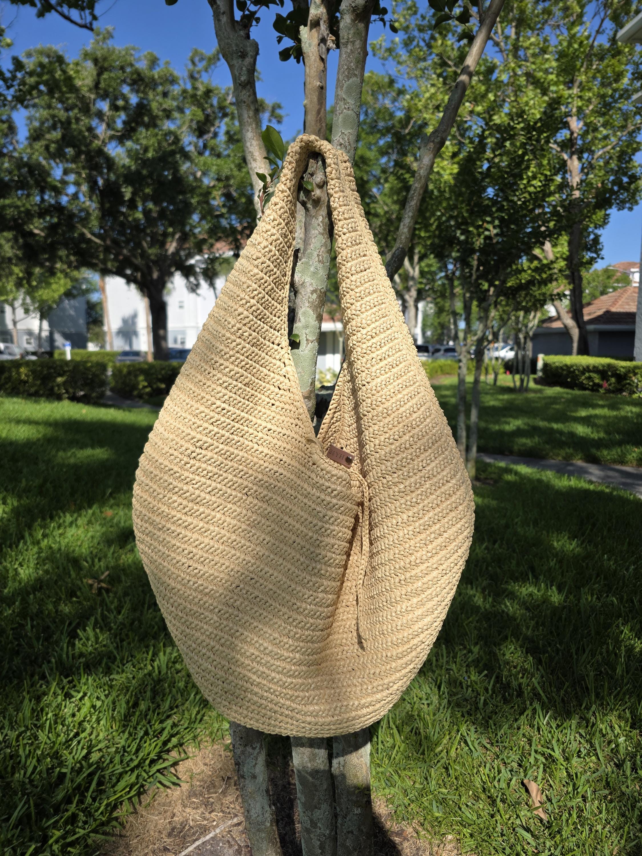 Woven-raffia hobo bag