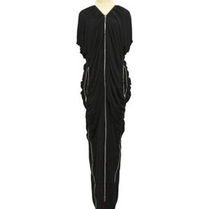 May include: A black maxi dress with a V-neckline and short sleeves. The dress features a full-length silver zipper down the front and two side zippers. The fabric is draped and ruched, creating a flowing silhouette.