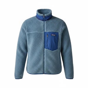 May include: A light blue fleece jacket with a high collar and a full-length zip. The jacket has a blue chest pocket with a zip and a small brand label. The jacket is made of a soft, textured material.