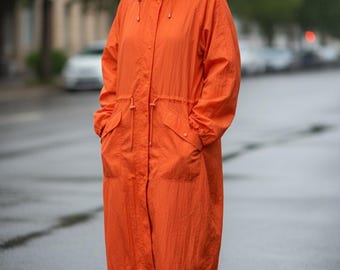 Chaquetas deportivas vintage Christian Dior con pliegues y cordón en color mandarina