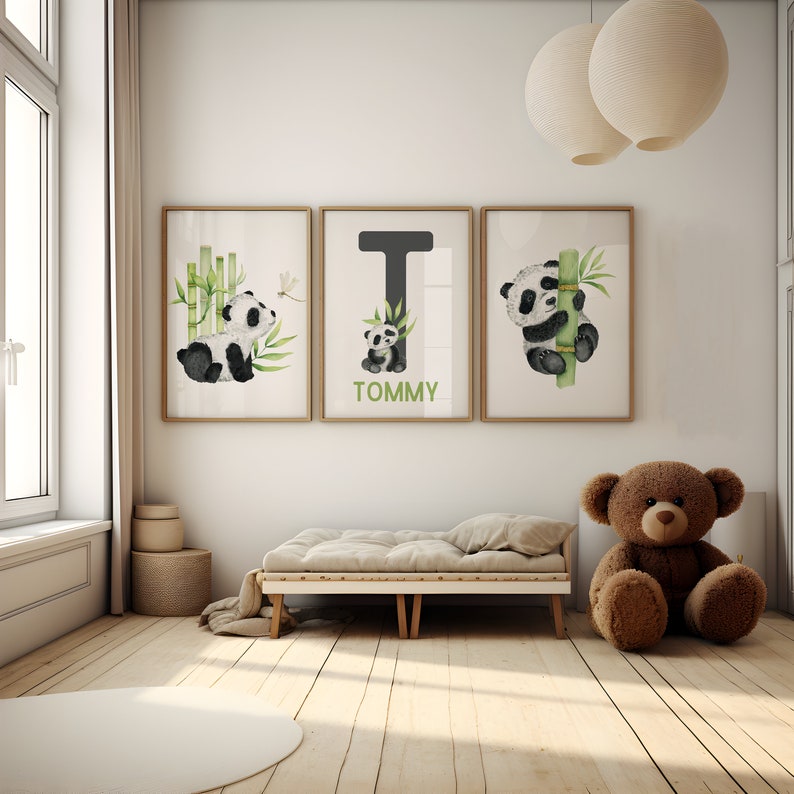 May include: Three framed prints with a watercolor illustration of a panda bear and bamboo. The middle print has the letter T and the name TOMMY written below it.