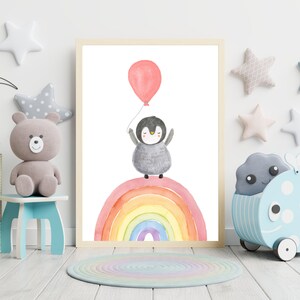 May include: A watercolor illustration of a penguin holding a pink balloon, standing on top of a rainbow. The background is white.