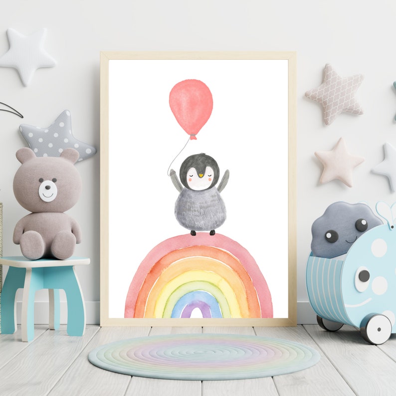 May include: A watercolor illustration of a penguin holding a pink balloon, standing on top of a rainbow. The background is white.