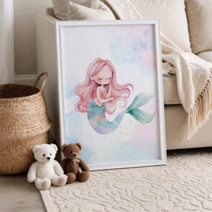 May include: A watercolor illustration of a mermaid with pink hair and a teal tail. The mermaid is holding her hands together in front of her chest. The background is a light blue with white clouds.