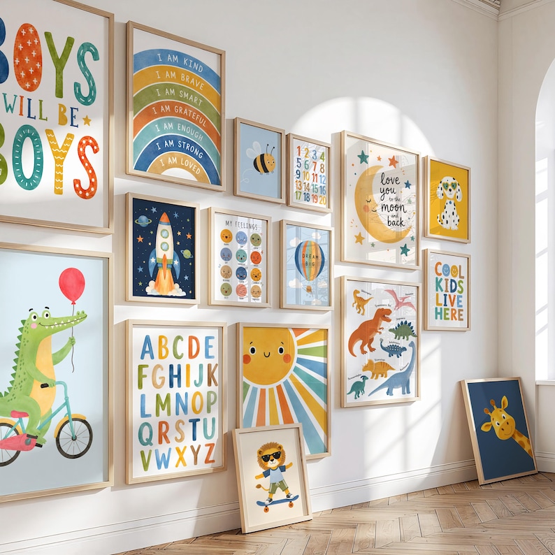 May include: A gallery wall featuring multiple framed prints with colorful illustrations including a rainbow with text, a rocket ship, a crocodile on a bicycle, a sun, dinosaurs, a lion on a skateboard, and various educational charts with letters and numbers.