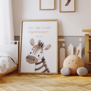 May include: A framed print with a watercolor illustration of a zebra with the text "You are loved beyond measure. John 3:16"