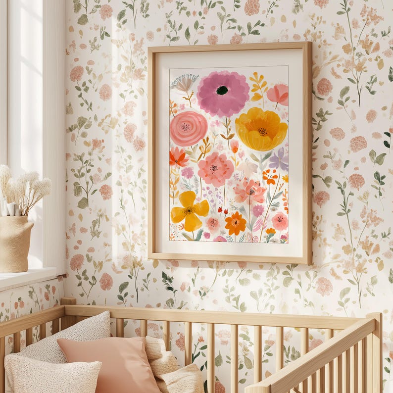 May include: A framed floral art print featuring a watercolor painting of colorful flowers in shades of pink, orange, yellow, and purple. The artwork is displayed on a floral wallpaper background, creating a cohesive and decorative aesthetic.