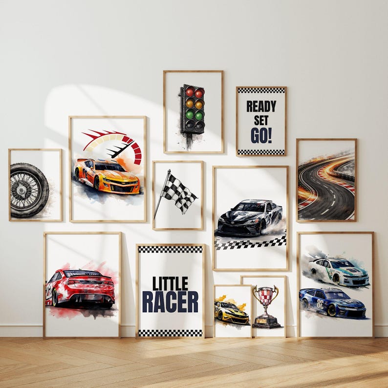 May include: A collection of framed watercolor art prints featuring race cars, racing flags, and racing-themed text. The prints include images of race cars in action, a checkered flag, and a traffic light.