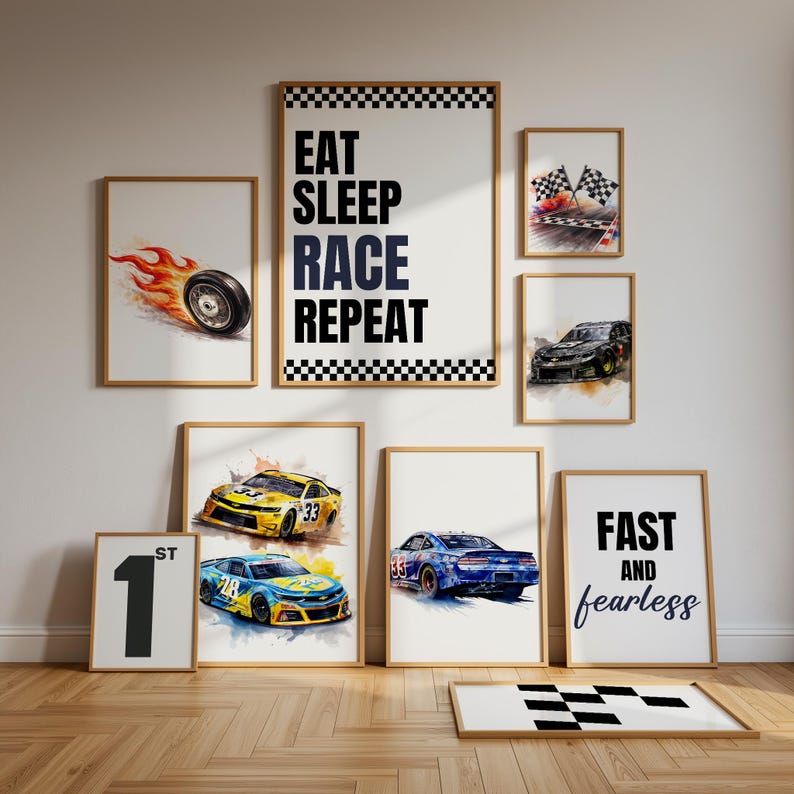 May include: A collection of framed wall art with a racing theme. The art includes watercolor illustrations of race cars, a flaming tire, checkered flags, and the phrases "Eat Sleep Race Repeat" and "Fast and Fearless."
