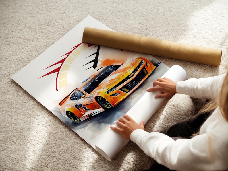 May include: Watercolor painting of an orange and yellow race car with black accents. The artwork is on a white canvas, with a brown paper tube and a rolled white paper tube nearby. The image is on a light-colored carpet.