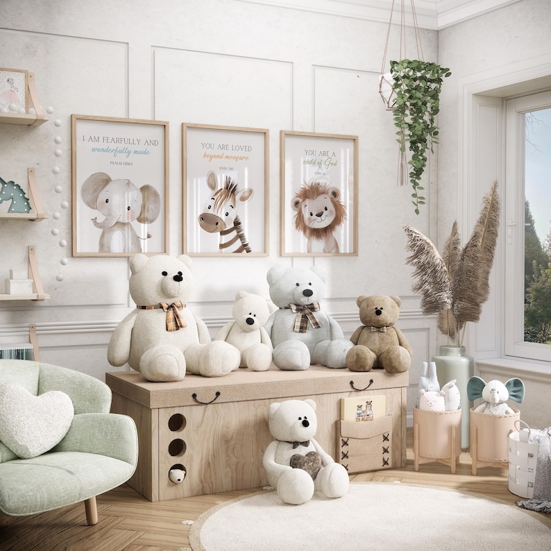 May include: A nursery room with a wooden chest and five stuffed teddy bears. The chest has three shelves and is decorated with a brown and white pattern. The teddy bears are all different colors and sizes. There are three framed prints on the wall with animal illustrations and inspirational quotes. The quotes are "I am fearfully and wonderfully made", "You are loved beyond measure", and "You are a child of God".