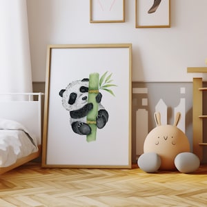 May include: A watercolor illustration of a black and white panda bear climbing a green bamboo stalk. The panda is holding onto the stalk with its paws and has a cute, playful expression on its face.
