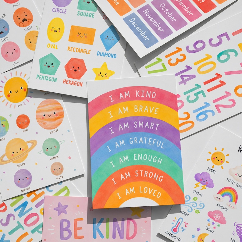 May include: A collection of colorful educational cards with illustrations and text. Cards feature shapes, numbers, planets, months, and positive affirmations like "I am kind." The cards have a cheerful, hand-drawn style, perfect for learning.