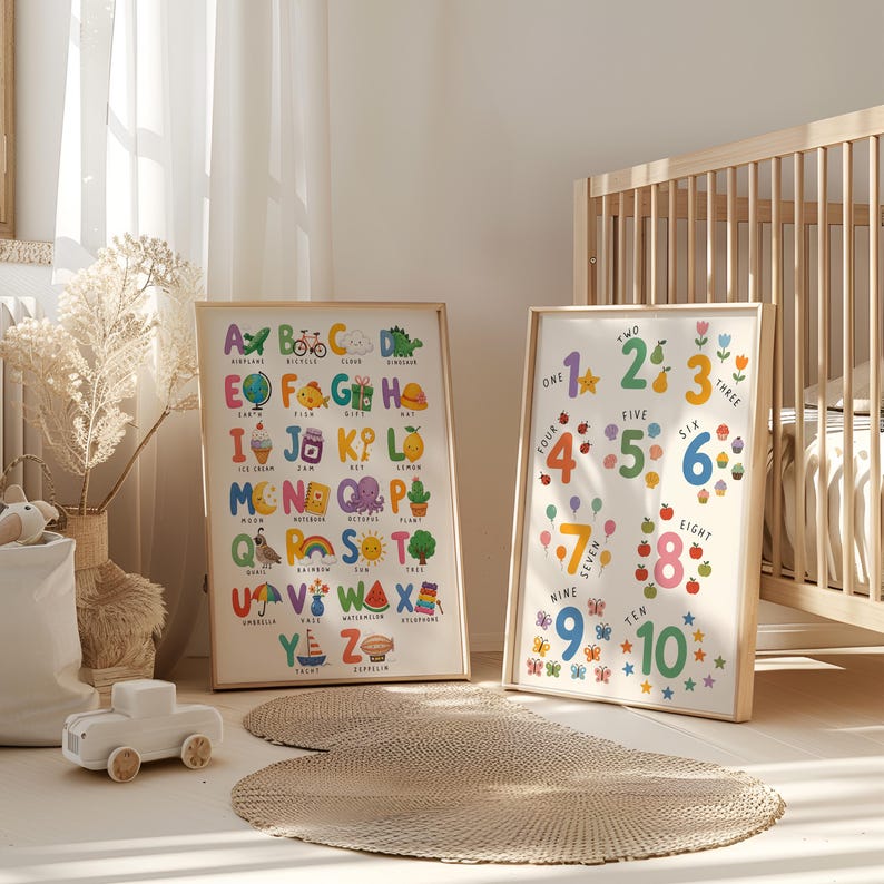 May include: Two framed educational prints. One features the alphabet with colorful illustrations, and the other displays numbers one through ten with corresponding images. The prints are in wooden frames, suitable for a child's room.