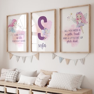 May include: Three framed prints with watercolour illustrations of fairies and a pink and purple colour scheme. The prints feature the text "A dream is a wish your heart makes", "S sofia", and "All you need is a faith, trust and a little bit of pixie dust".
