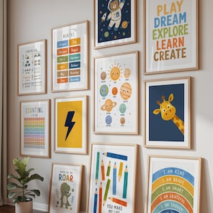 May include: A gallery wall featuring ten framed prints with educational and whimsical themes, including a solar system chart, a giraffe, a dinosaur, a rainbow with affirmations, counting charts, months of the year, and colorful pencils.