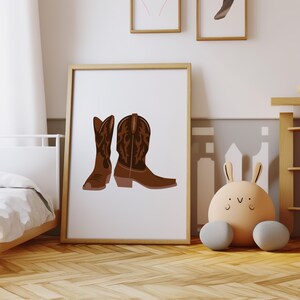 May include: A pair of brown cowboy boots with intricate stitching and a pointed toe. The boots are set against a white background.