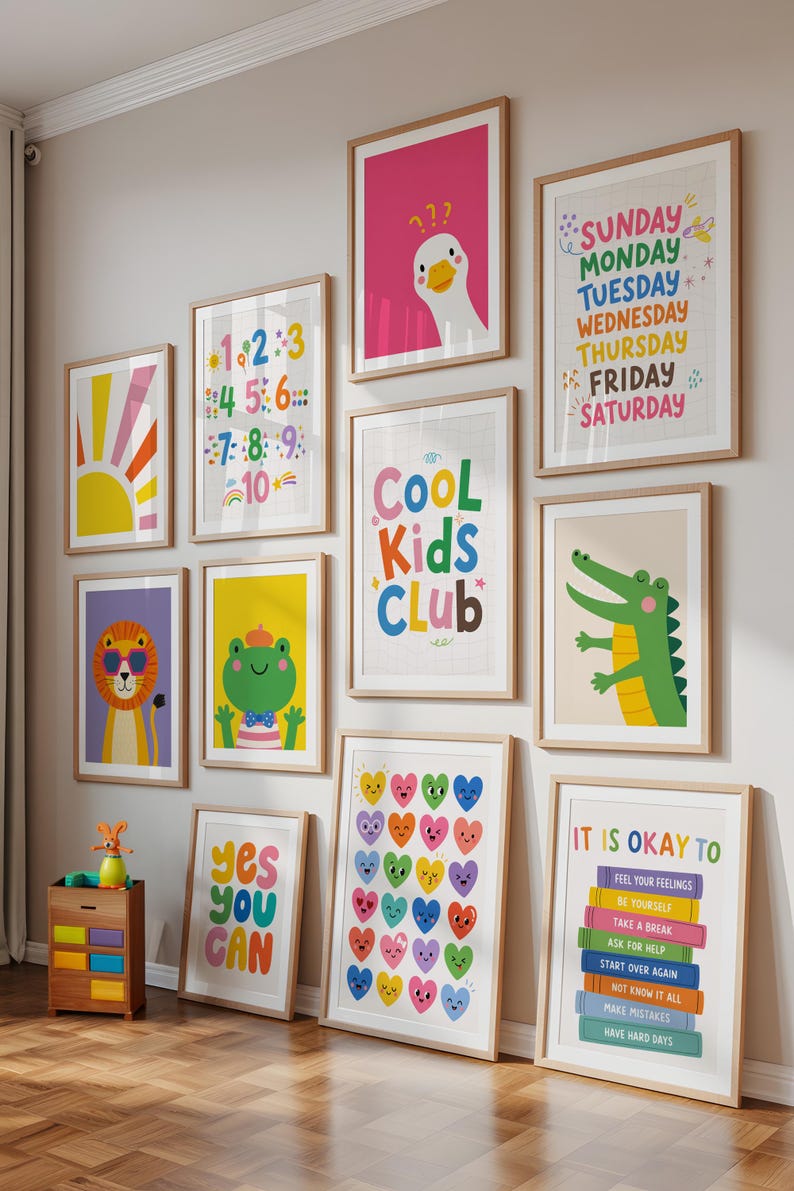 May include: A collection of framed art prints with colorful illustrations and motivational quotes. The prints feature a variety of designs, including a sun, a lion, a frog, a crocodile, hearts, and the text "Cool Kids Club".