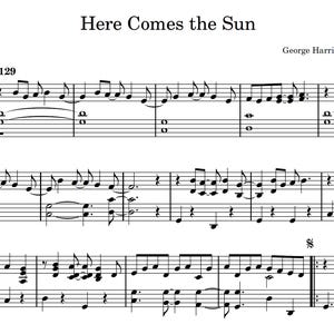 Può includere: Sparttitura per la canzone "Here Comes the Sun" di George Harrison, con il testo e la notazione musicale per il pianoforte.