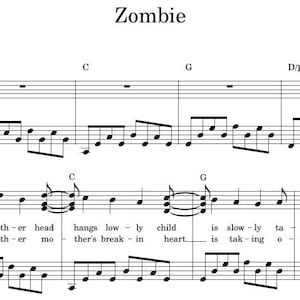 May include: Sheet music for the song "Zombie" by The Cranberries. The music is written in the key of E minor and features lyrics like "Another head hangs lowly, there's a break in the heart."