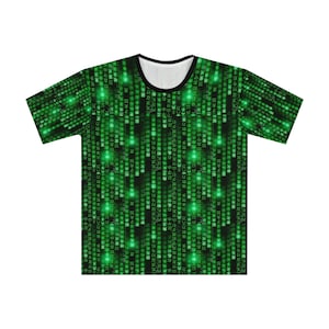 May include: A green and black t-shirt with a repeating pattern of green code on a black background. The code is in a variety of fonts and sizes.