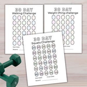 May include: Three white sheets of paper with fitness challenges. The top two sheets read "30 DAY Walking Challenge" and "30 DAY Weight lifting challenge". The bottom sheet reads "30 DAY Squats Challenge". A green dumbbell is in the lower left corner.