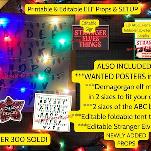 May include: Printable and editable Elf props and setup, including an ABC board with lights, a Stranger Things sign, and a tent card. The image also includes wanted posters, Demagorgan elf masks, and other props. The text says "Over 300 Sold!"