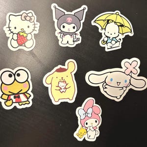 Kitty hello sticker pack. 2 inches each roughly Waterproof and made with high quality vinyl. Waterbottle and laptop stickers.