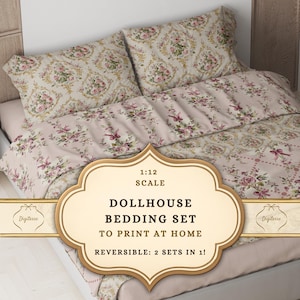 May include: Dollhouse bedding set with a floral pattern in pink, cream, and gold. The set includes a comforter and two pillowcases. The text on the image reads "1:12 Scale Dollhouse Bedding Set To Print At Home".