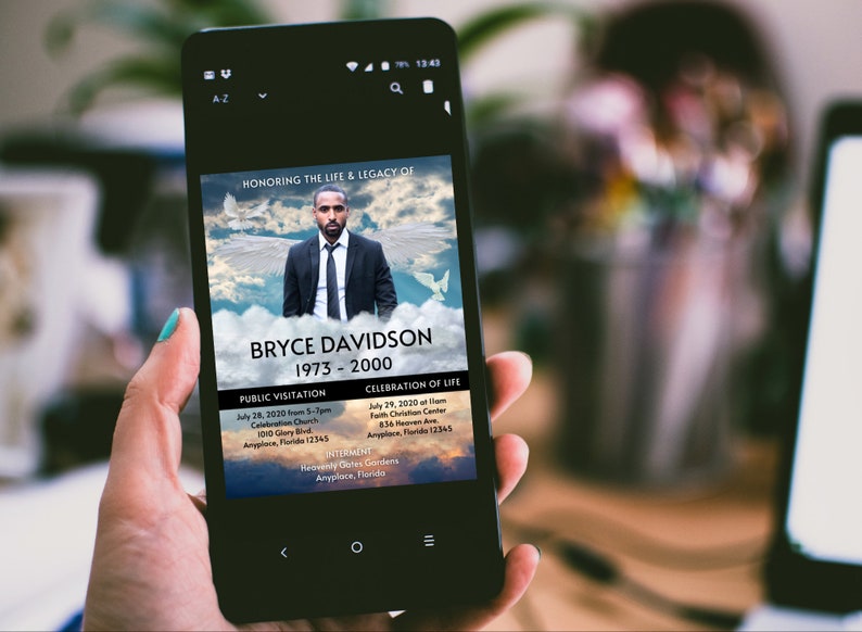 May include: A digital memorial card for Bryce Davidson, 1973-2000. The card features a photo of Bryce against a cloudy sky with angel wings. It includes details for a public visitation and celebration of life.