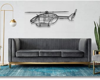 Silhouette di un aereo in metallo raffigurante un Eurocopter EC145