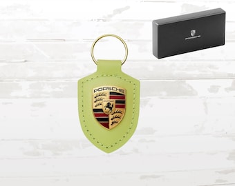 Porsche-sleutelhanger: geel Cartagena-pythonleer met gouden embleem
