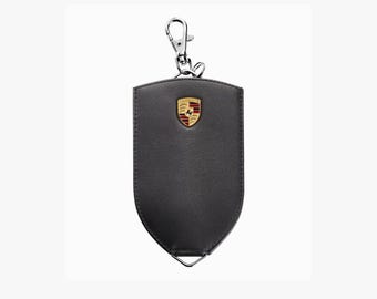 Leren Porsche sleuteletui: zwart rundleer met metalen embleem