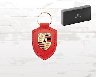 Leren Porsche-sleutelhanger: 75 Years Edition Lava Orange Crest
