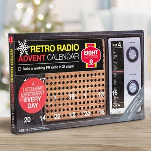 May include: Retro Radio Advent Calendar with a vintage radio design. The box features the text "Retro Radio Advent Calendar" and "Build a working FM radio in 24 steps!" Includes a detailed day-by-day instruction booklet. Age 14+.