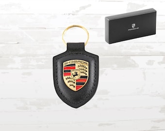 Leren Porsche-sleutelhanger zwart: embleem goudkleurig embleem, geschenkverpakking