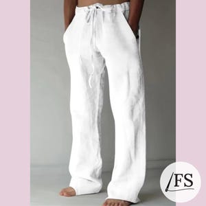 May include: White linen pants with a drawstring waist and side pockets.