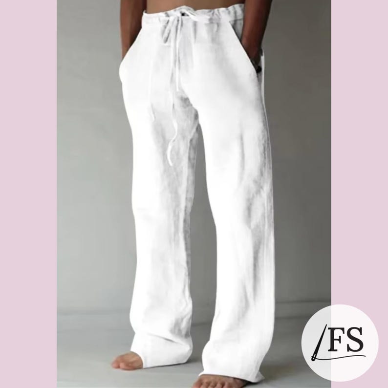 May include: White linen pants with a drawstring waist and side pockets.