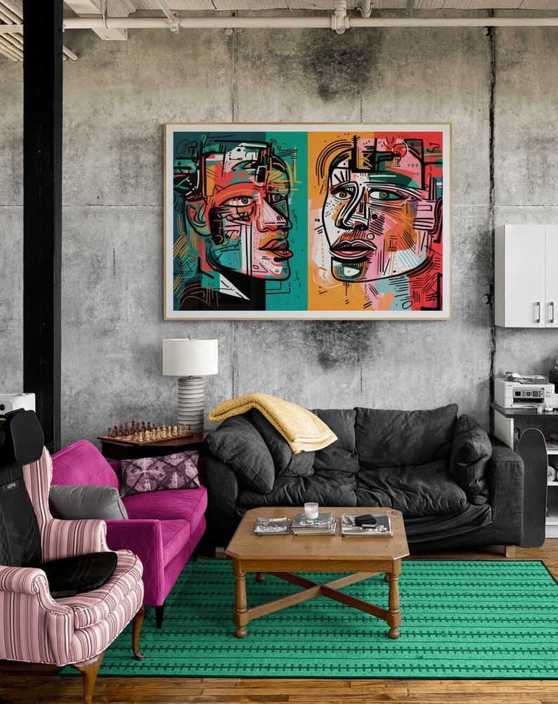 Puede incluir: Una impresi&oacute;n de arte abstracto enmarcada que presenta dos retratos coloridos de personas con patrones geom&eacute;tricos. La impresi&oacute;n est&aacute; colgada en una pared de concreto gris sobre un sof&aacute; negro y un sill&oacute;n rosa.
